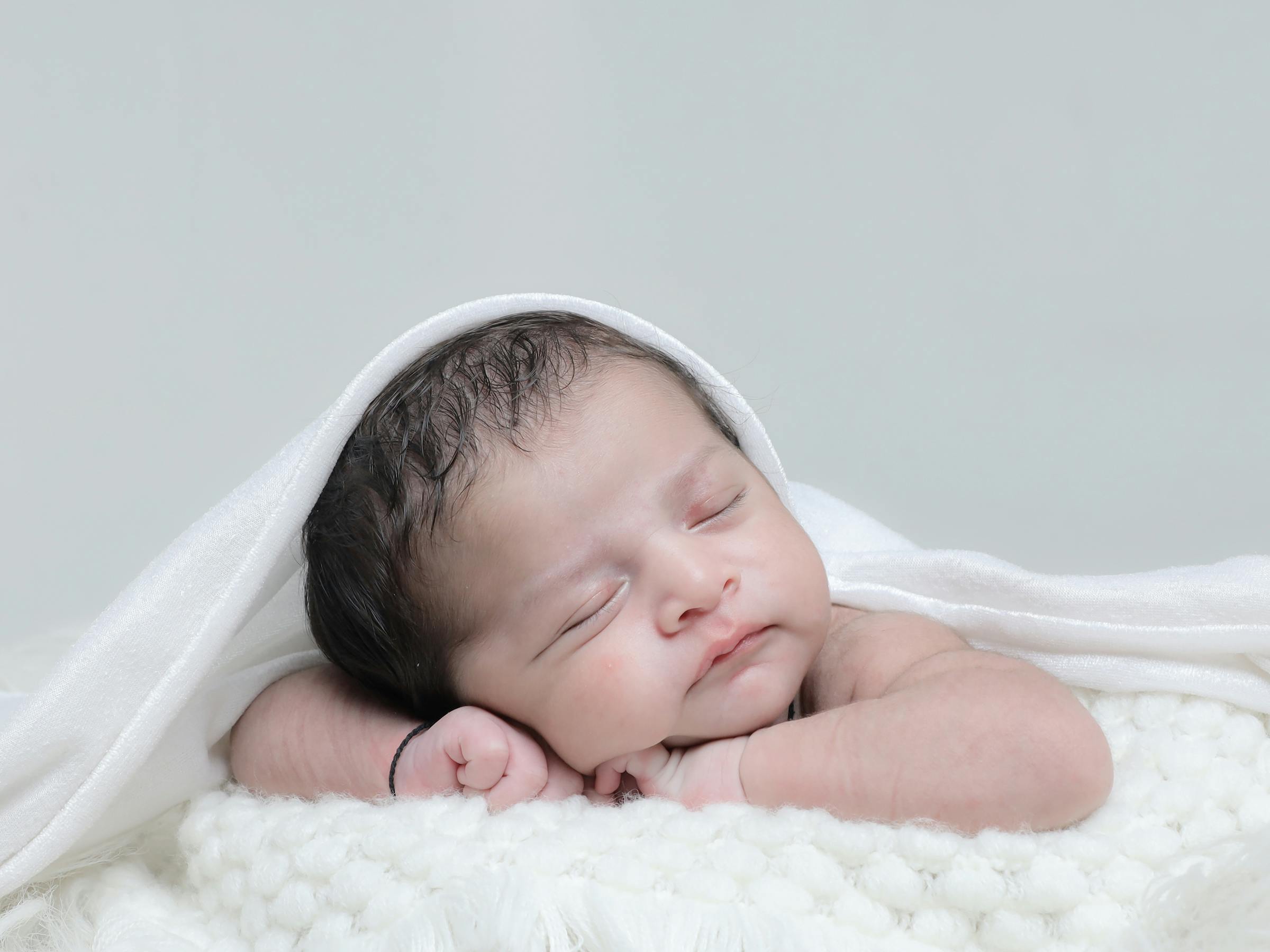 Bonnet bébé naissance : l’indispensable de la garde-robe de bébé